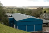 The meat cutting plant at Raisgill Hall with a backcrop of the Cumbrian fells.