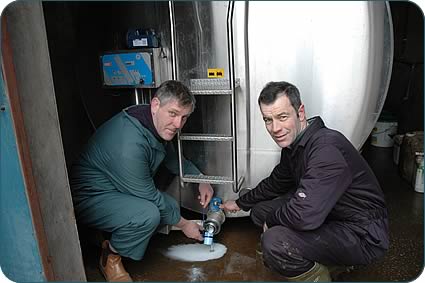 Vet Graham Brooks takes a milk sample to test for Johne's Disease in Ian Bulman's Bankhouse Holstein herd.