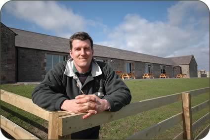 Rod Smith outside the barn