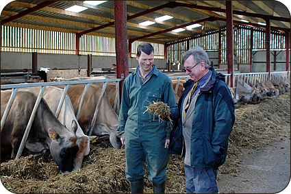 Hodgson Stamper, left, discusses silage quality with seedsman David Baldwin