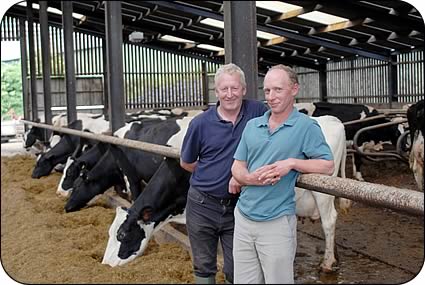 Ian and Mark Mallinson in in the light and airy cow housing