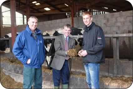 Harry, left, and David Hodgson assess the TMR with Carrs Billington nutritionist Gareth Brolly, centre.