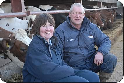 Christine and David with the milkers