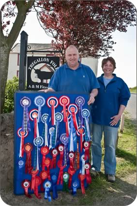 Alastair and Meg with their collection of rosettes from only two show seasons